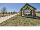 View of the park shelter and walking path on a sunny day at 375 Longspur Dr, Brighton, CO 80601