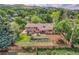 Aerial view of the home, highlighting the layout, backyard, landscaping, and surrounding neighborhood at 960 S Arbutus St, Lakewood, CO 80228