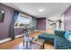 Cozy living room with hardwood floors and a clear view to the kitchen at 960 S Arbutus St, Lakewood, CO 80228