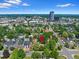 Aerial view of property in a residential neighborhood, centrally located, with mature tree coverage at 1080 S Garfield St, Denver, CO 80209