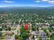 This aerial view shows the location of this home in a mature neighborhood with tree coverage at 1080 S Garfield St, Denver, CO 80209