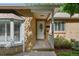 Close-up of the home's front entrance with a decorative glass door and charming details at 1080 S Garfield St, Denver, CO 80209