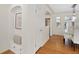 Hallway with built-in bench seat leading to the kitchen and dining area at 1080 S Garfield St, Denver, CO 80209