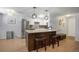 Bright, modern kitchen with stainless steel appliances, granite countertops, and a stylish kitchen island at 1260 York St # 102, Denver, CO 80206