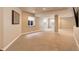 Finished basement with plush carpet, multiple windows, and ample open space perfect for recreation at 3070 Redhaven Way, Highlands Ranch, CO 80126