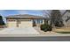 Charming ranch-style home with a two-car garage and well-maintained landscaping at 5480 Craftsman Dr, Parker, CO 80134
