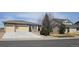 Charming ranch-style home with a two-car garage and well-maintained landscaping at 5480 Craftsman Dr, Parker, CO 80134