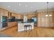 Spacious kitchen featuring wooden cabinets and stainless steel appliances at 5480 Craftsman Dr, Parker, CO 80134