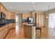 Well-appointed kitchen with custom cabinets and a center island sink at 5480 Craftsman Dr, Parker, CO 80134