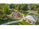 A playground with a shade cover and picnic tables in a well maintained park at 12760 Ironstone Way # 103, Parker, CO 80134