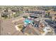 An aerial view of a stunning community pool, playground and lounging area at 12760 Ironstone Way # 103, Parker, CO 80134