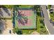 Aerial view of tennis courts in a well maintained recreation area in the community at 12760 Ironstone Way # 103, Parker, CO 80134