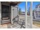 Cozy patio with seating area, perfect for enjoying the outdoors and relaxing at 8331 S Upham Way # 101, Littleton, CO 80128