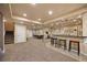 Large basement with pool table, kitchenette, exercise equipment, stairs to the first floor at 5791 Chisholm Pl, Parker, CO 80134