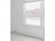 Bright bedroom features a large window offering great natural light and neutral carpet at 9453 W Utah Pl, Lakewood, CO 80232