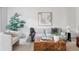 Cozy living room with a comfortable sofa, stylish decor, and ample natural light creating a relaxing ambiance at 9453 W Utah Pl, Lakewood, CO 80232