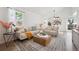 Bright living room with vaulted ceilings, a ceiling fan, and lots of natural light at 15942 E Rice Pl # B, Aurora, CO 80015