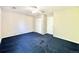 Neutral bedroom with blue carpet, closet, ceiling fan, and lots of natural light at 2247 Coronado Pkwy N #D, Denver, CO 80229
