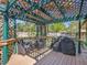Charming deck featuring a pergola, comfortable seating, and a grill at 13133 Regulus Dr, Lone Tree, CO 80124