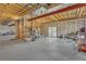 Unfinished basement with exposed ceiling and concrete floor with sliding glass doors at 6839 Estes Dr, Arvada, CO 80004