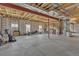 Unfinished basement with exposed ceiling and concrete floor ready to be designed at 6839 Estes Dr, Arvada, CO 80004