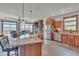 Gourmet kitchen with granite countertops, stainless steel appliances, and beautiful views at 6839 Estes Dr, Arvada, CO 80004