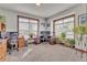 Bright office space with two desks, large windows, and ample natural light perfect for working from home at 6839 Estes Dr, Arvada, CO 80004