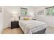 A comfortable bedroom featuring a window, and coordinated decor at 3298 Quail St, Wheat Ridge, CO 80033