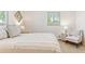 A bedroom with soft lighting, stylish furnishings, and cozy ambiance at 3298 Quail St, Wheat Ridge, CO 80033