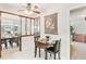A view of the dining area showcasing seamless design into other rooms at 3298 Quail St, Wheat Ridge, CO 80033