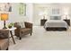 Main bedroom features comfortable furniture at 3298 Quail St, Wheat Ridge, CO 80033