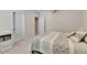 Cozy bedroom with soft patterned bedding and a white dresser, adjacent to the closet at 1195 Melting Snow Way, Castle Rock, CO 80109