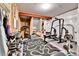 Home gym showcasing a variety of workout equipment and weights on impact absorbent flooring at 1195 Melting Snow Way, Castle Rock, CO 80109