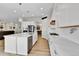 Gourmet kitchen with a large island, stainless steel appliances, and plenty of cabinet space at 1195 Melting Snow Way, Castle Rock, CO 80109