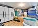 Organized storage area with shelving, cabinets, and assorted containers for household goods at 1195 Melting Snow Way, Castle Rock, CO 80109