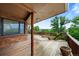 Wooden deck offers outdoor living space with scenic views of the surrounding landscape at 1961 S Xenia Ct, Denver, CO 80231