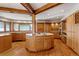 Large, traditional-style kitchen featuring custom wood cabinetry, hardwood floors, and a functional center island at 1961 S Xenia Ct, Denver, CO 80231