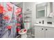 Modern bathroom featuring a vanity with sink, Paris themed decor, and bright lighting at 11716 Fairplay St, Commerce City, CO 80603