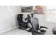 Gaming setup in carpeted room with modern hexagon wall decor and a window that provides natural light at 5099 S Robb St, Littleton, CO 80127