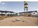 Community area with modern houses and playground at 5099 S Robb St, Littleton, CO 80127