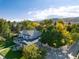 Aerial view of two-story house with large backyard at 5451 S Zinnia Ct, Littleton, CO 80127