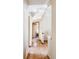 Hardwood floors and neutral walls make this hallway inviting at 5451 S Zinnia Ct, Littleton, CO 80127