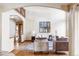 Elegant living room with vaulted ceilings and hardwood floors at 5451 S Zinnia Ct, Littleton, CO 80127