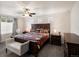 Bright bedroom with a ceiling fan, carpet flooring, and modern furniture at 5358 Ventura St, Denver, CO 80249