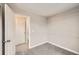 Bedroom has neutral walls and carpeted floors plus closet storage at 4899 S Dudley St # 17G, Littleton, CO 80123