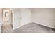 Bedroom featuring carpet, closet, and entry to bathroom at 4899 S Dudley St # 17G, Littleton, CO 80123