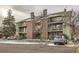 Multi-Gathering residence with balconies, brick features, convenient parking, and well-kept grounds for enhanced curb appeal at 4899 S Dudley St # 17G, Littleton, CO 80123