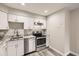 Well-lit kitchen features stainless steel appliances and granite countertops at 4899 S Dudley St # 17G, Littleton, CO 80123