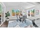 Dining area with stylish chandelier and view of the fenced backyard at 20529 E Brunswick Pl, Aurora, CO 80013