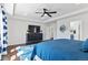 Main bedroom with tray ceilings, ceiling fan, and dark wood flooring at 20529 E Brunswick Pl, Aurora, CO 80013